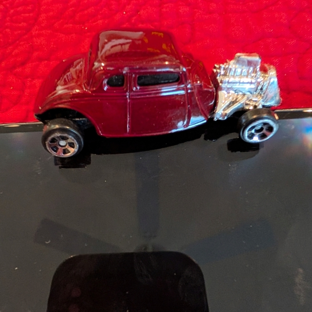 Classic Red Toy Car with Engine Detail